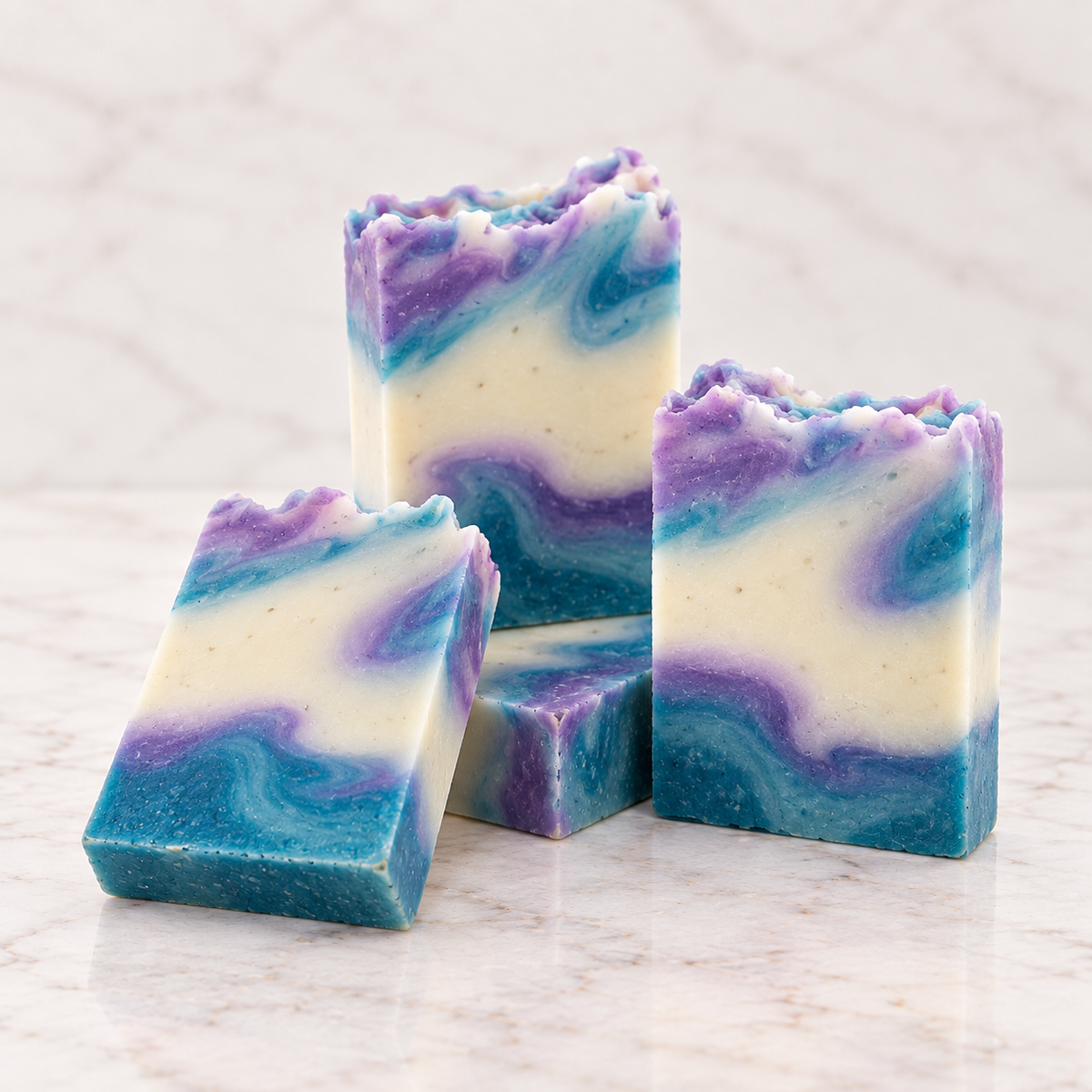Heather Reeks handmade olive oil soap bars with purple, blue and cream marbling by Fleur & Stone Ireland.
