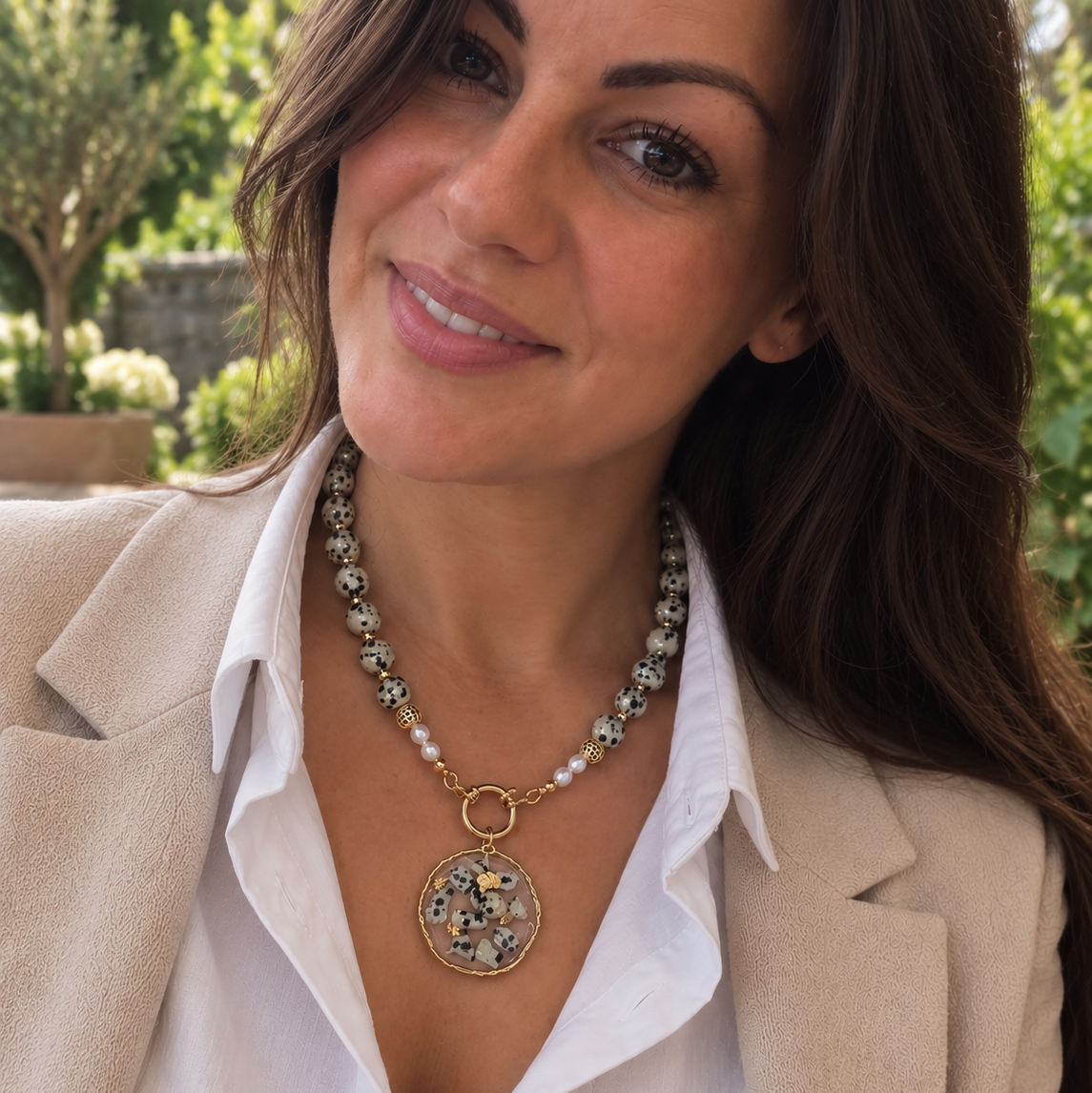 Dalmatian Gold Dalmatian Jasper necklace worn with handmade interchangeable gemstone resin pendant