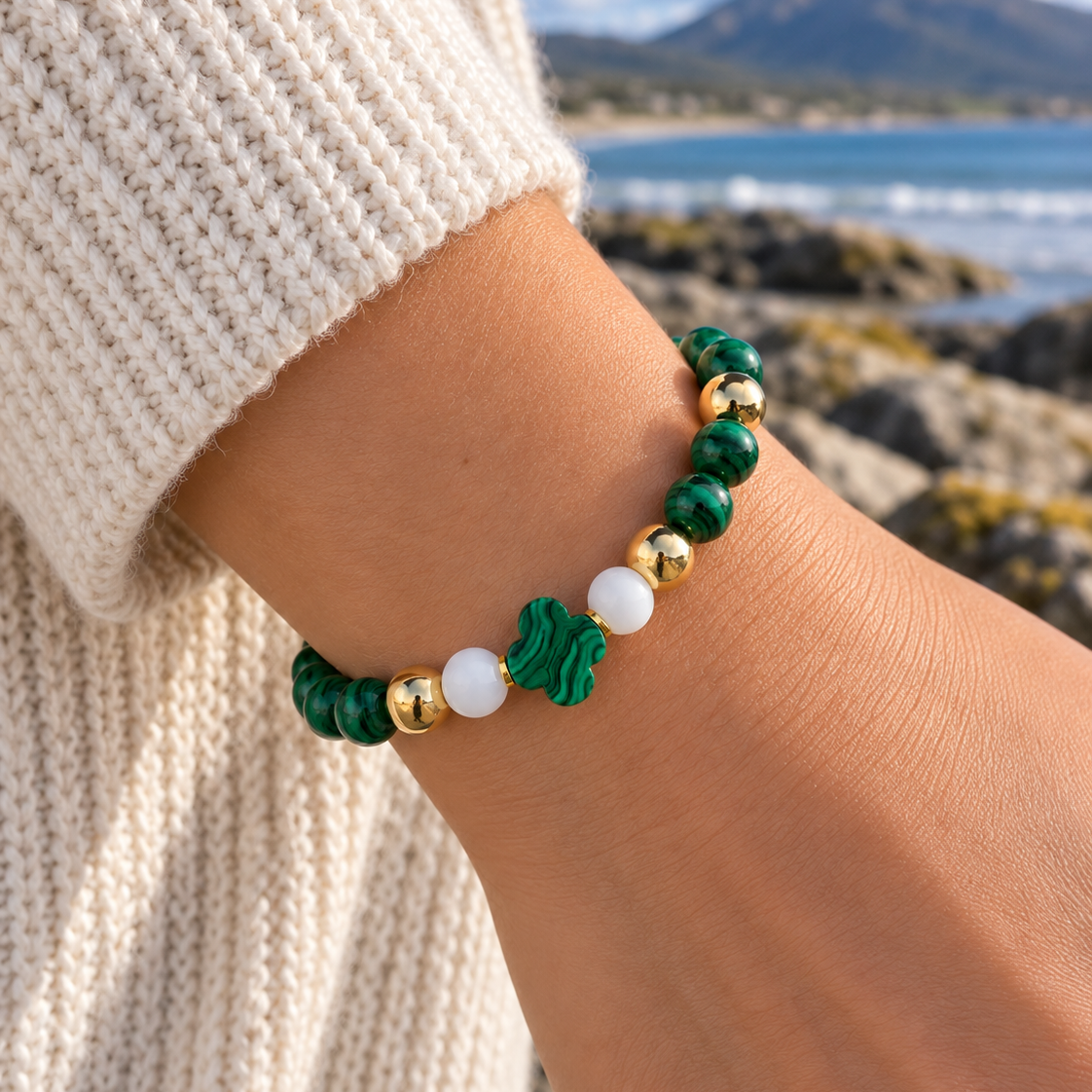 Emerald Clover Malachite and White Agate bracelet worn on wrist by the Kerry coast