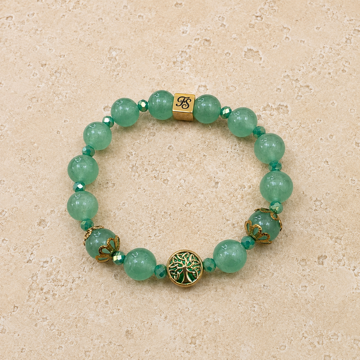 Natural Green Aventurine 10mm gemstone bracelet with gold-plated stainless steel Tree of Life charm and Fleur & Stone logo bead