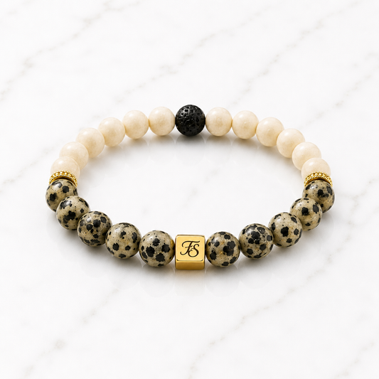 Frosted Fossil and Dalmatian Jasper gemstone bracelet with lava stone, gold plated rhinestone spacers and Fleur & Stone logo bead.